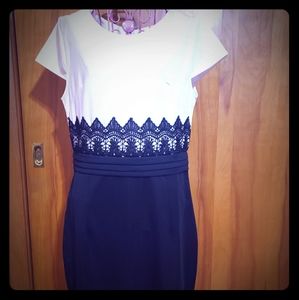 Black and white dress with lace applique detail